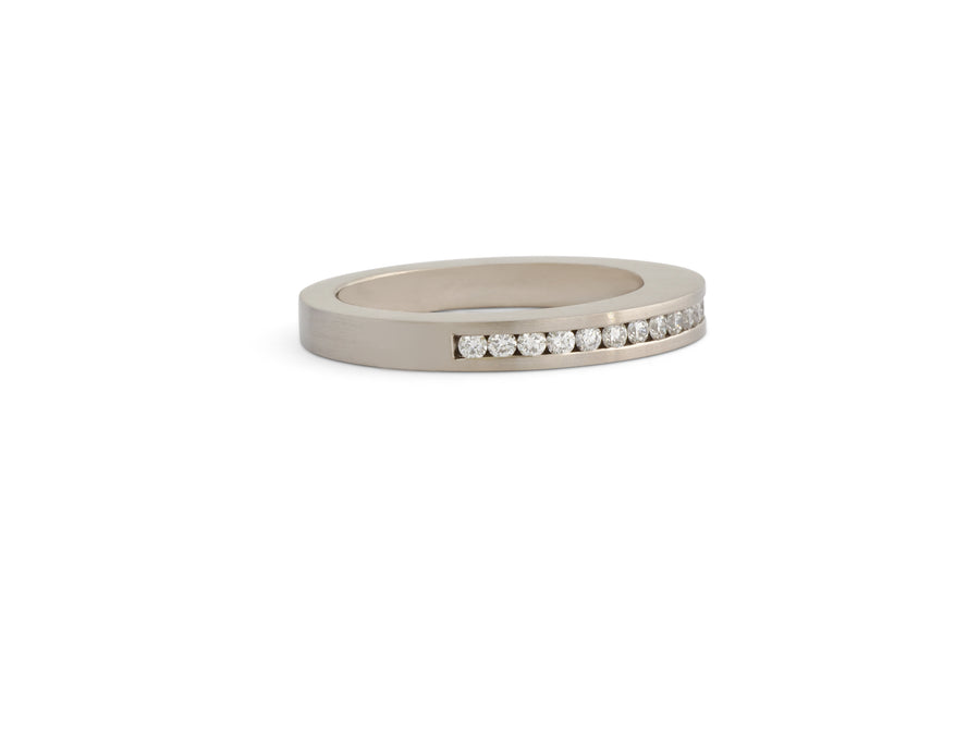 channel set diamonds in white gold ring