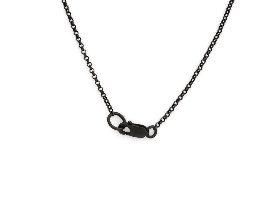Gold double halo pendant on oxidised silver chain