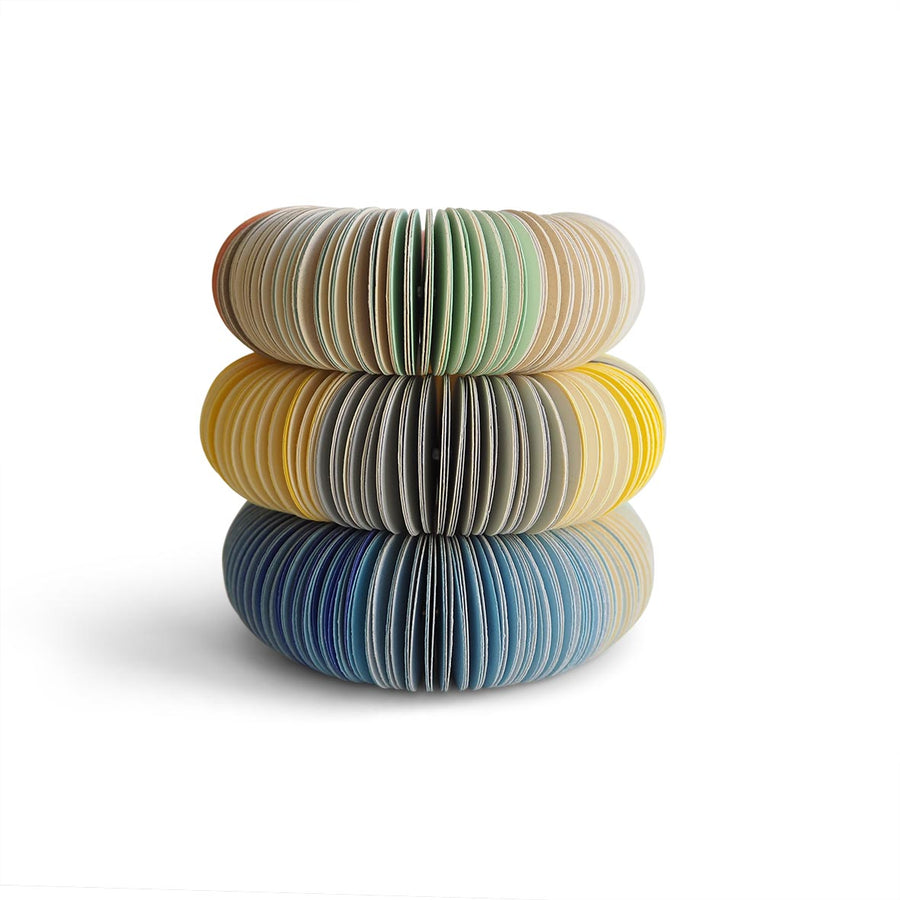 paper bangle stack. Mint, grey, blue.